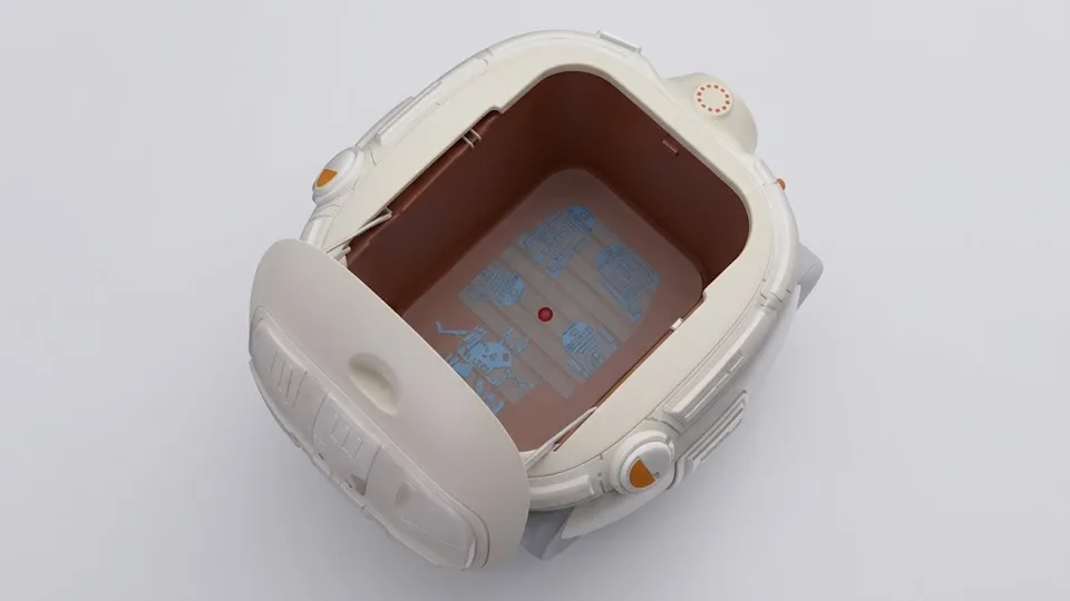 Overhead view of the Grogu gitamini’s open storage compartment