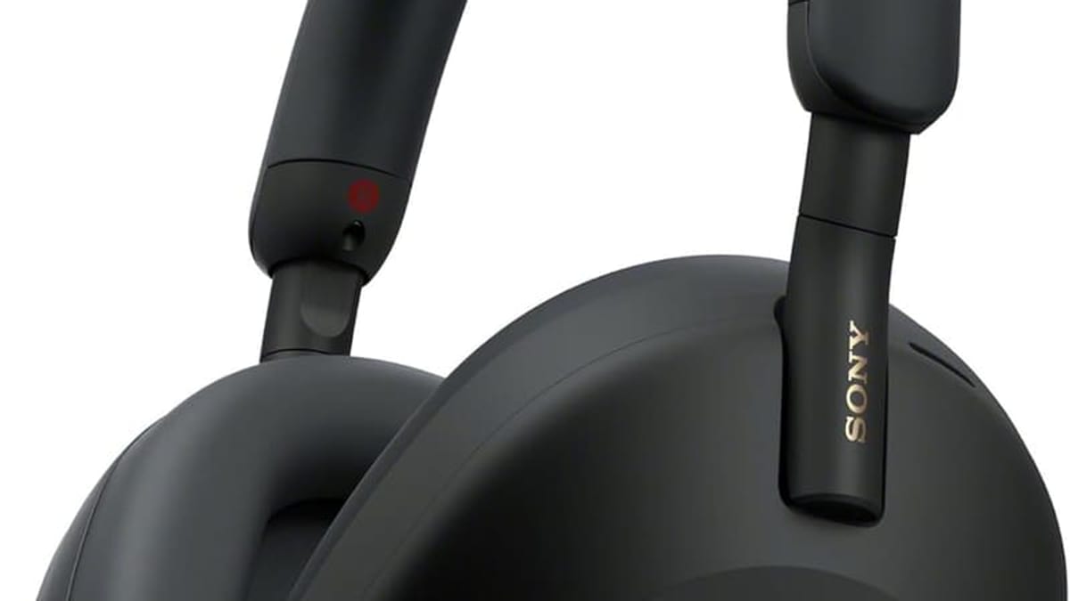 Sony WH-1000XM5 wireless headphones in hand